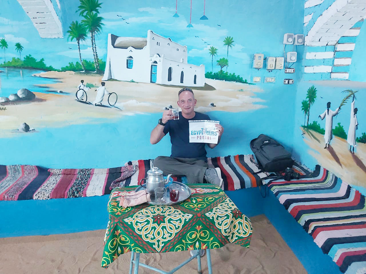 Our Customer Drinks the Egyptian Tea in the Nubian Village - How to Enjoy a Classic Holiday in Egypt - Egypt To